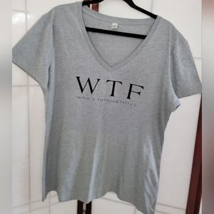 Women's v-neck grey tee-shirt "who's turning fifty"